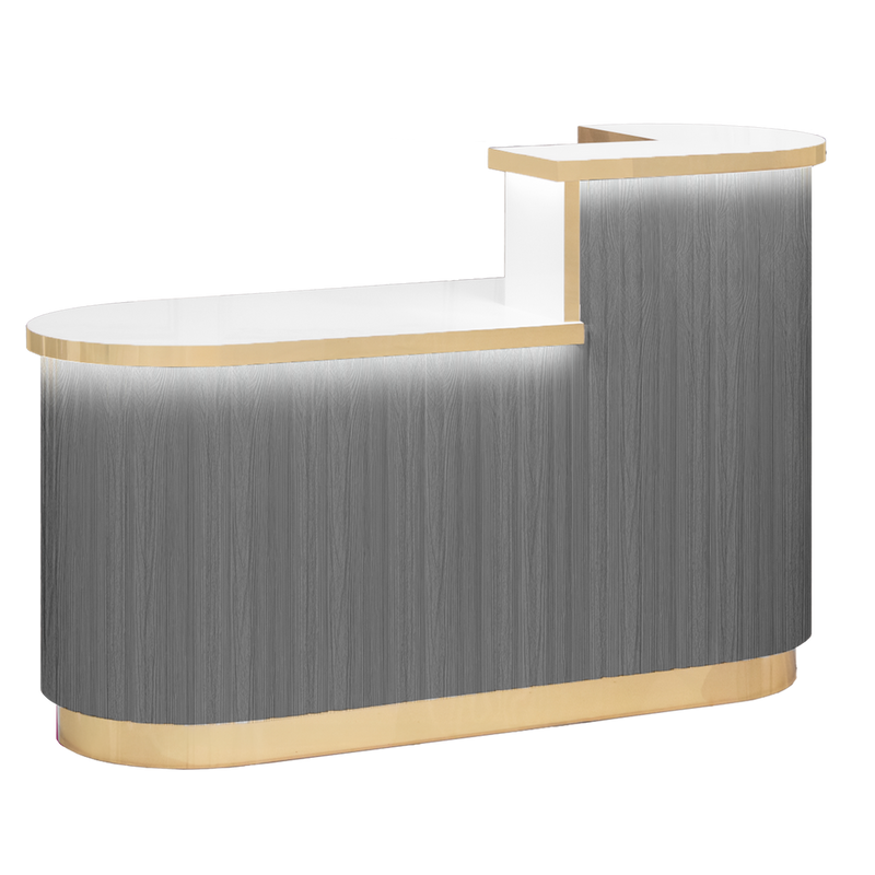 Modern reception desk with gray and gold finish on a white background